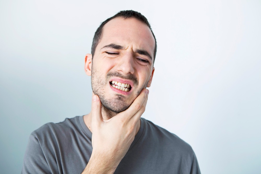 man suffering from swollen face