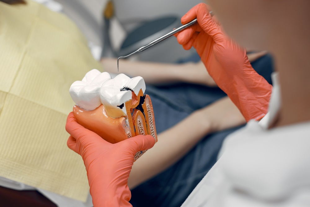 dentist explaining about root canal treatment