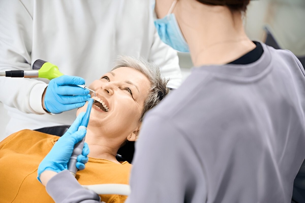 Dentist performing professional dental cleaning in York
